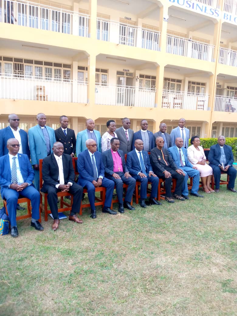 The Guid President standing with the council members, Chancellor of Bishop Stuart University in a pic after a celemony of welocoming a new Vice Chancellor