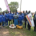flagging  off the university sports team ahead of the East Africa Inter-University Games
