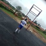 Hon SSESANGA visiting the site of the new volley ball and netball play ground