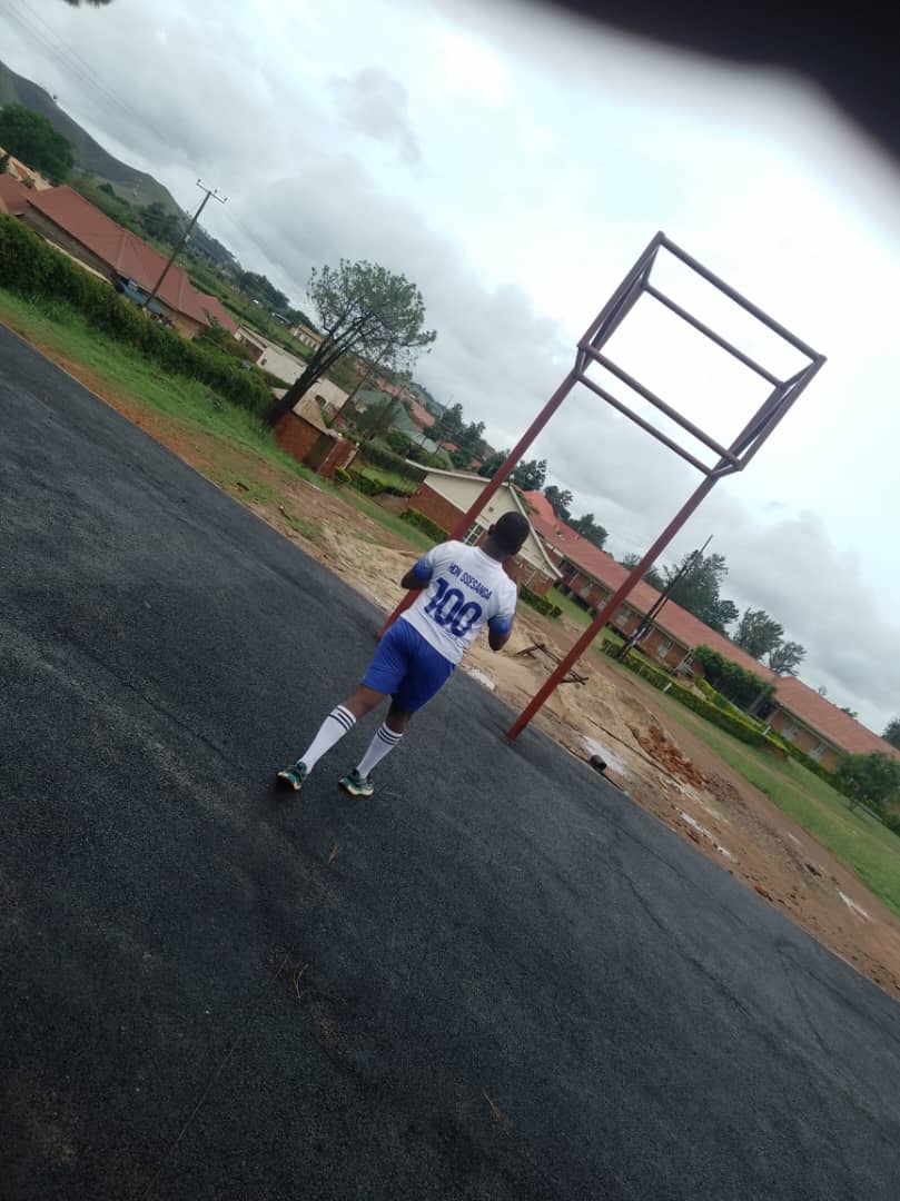 Hon SSESANGA visiting the site of the new volley ball and netball play ground
